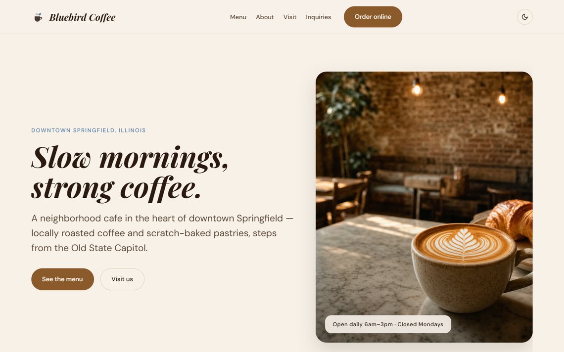 Homepage of the Bluebird Coffee & Bake Shop preview site, showing an italic serif hero next to a warm cafe interior photo with latte art